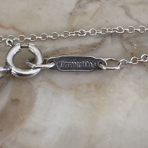 Tiffany & Co. 18K Gold & Sterling Silver Heart & Bow Ribbon Necklace - Picture 5 of 10